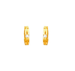 Hoop earrings in 18 karat yellow gold and studded with diamonds
