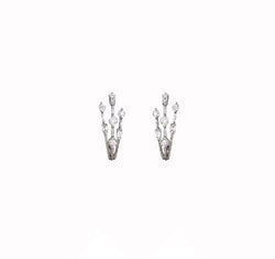 Hoop earrings crafted from 18 karat white gold with diamonds.